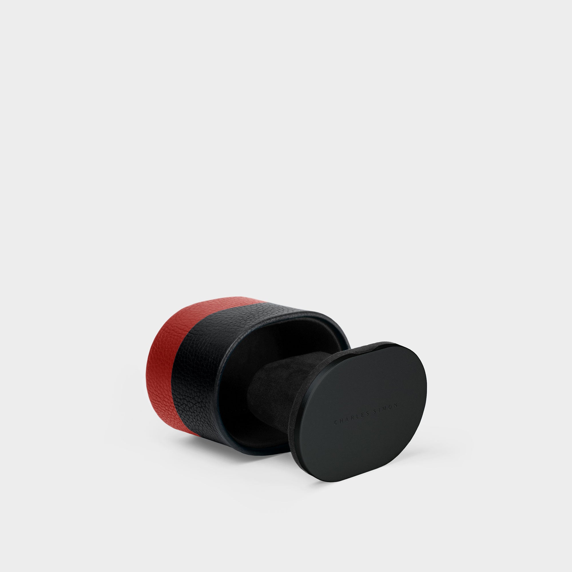 Product photo of open Theo leather Watch roll in black and red. Inspired by F1 racing. Handmade in Canada. 