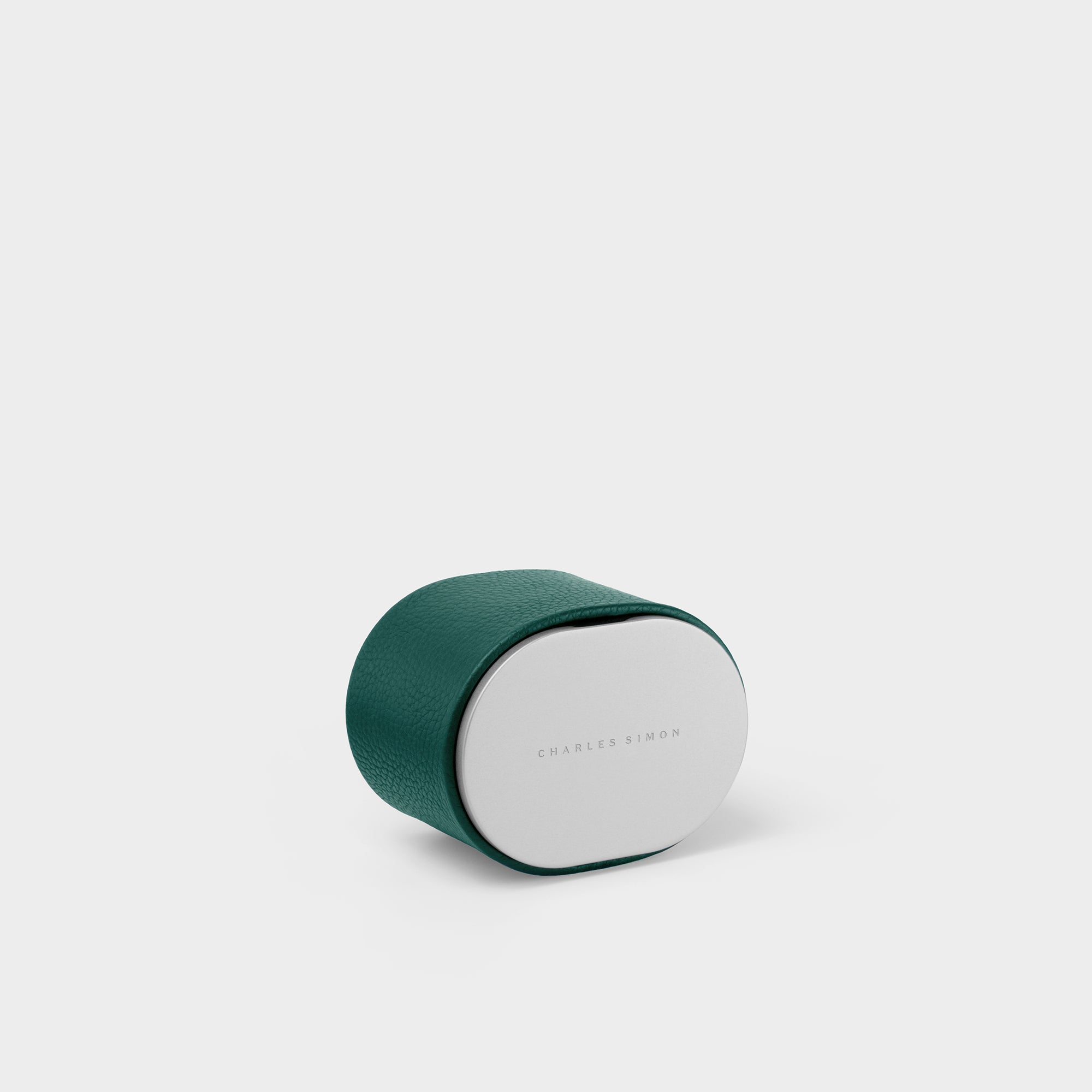 Closed emerald leather Theo handmade watch roll by Charles Simon