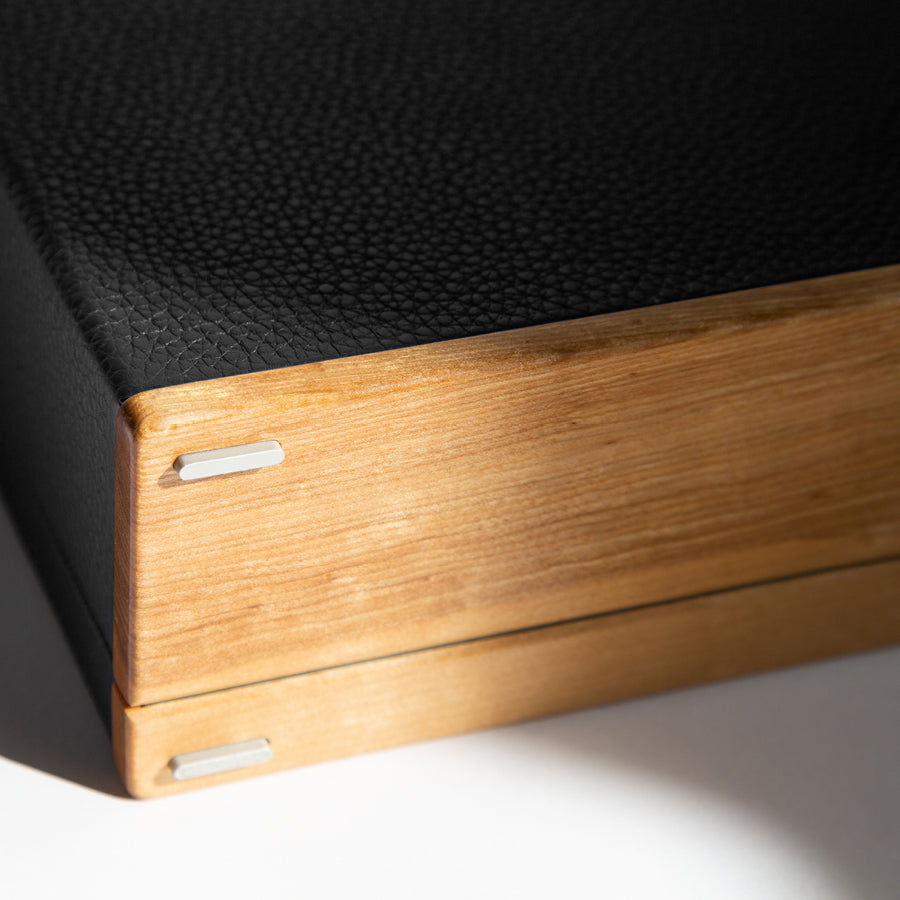 Detail photo of sustainable recycled wood used in the Mackenzie Original briefcase 