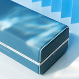 Closeup shot of closed limited edition summer Moraine toiletry bag in sky blue leather with white contrast stitching 