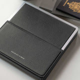 Lifestyle shot of Fraser travel wallet made from premium graphite French leather