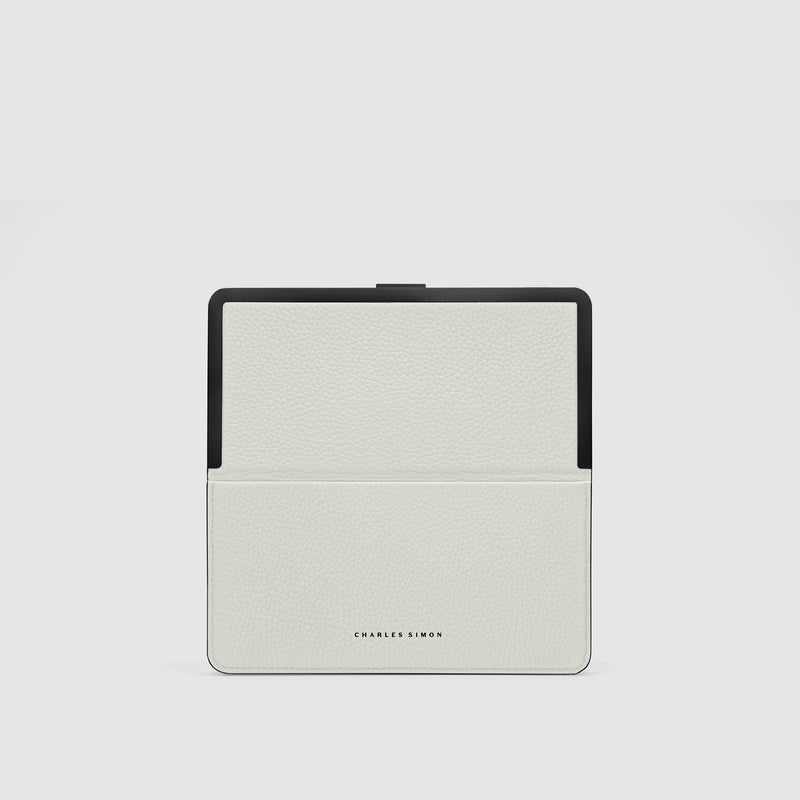 Front shot of Fraser travel wallet by Charles Simon made from white French leather and black anodized aluminum