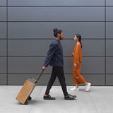 Charles Simon Bonaventure rolling luggage in black, lifestyle 3