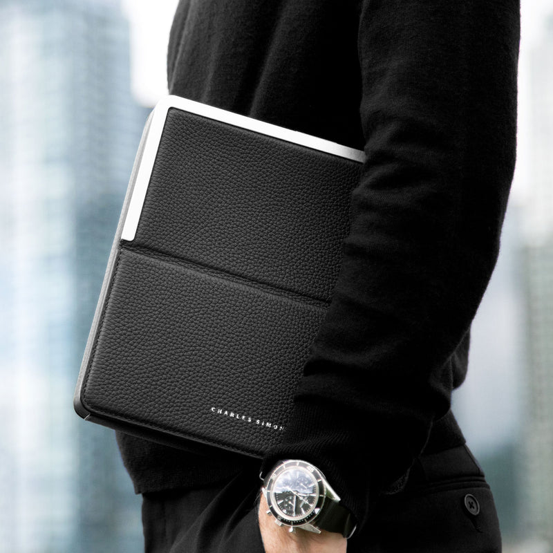 Lifestyle shot of Fraser travel wallet made to conveniently carry travel essentials in a compact format