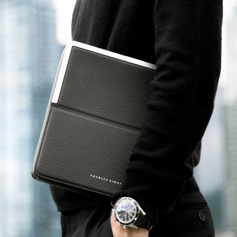 Lifestyle shot of Fraser travel wallet made to conveniently carry travel essentials in a compact format